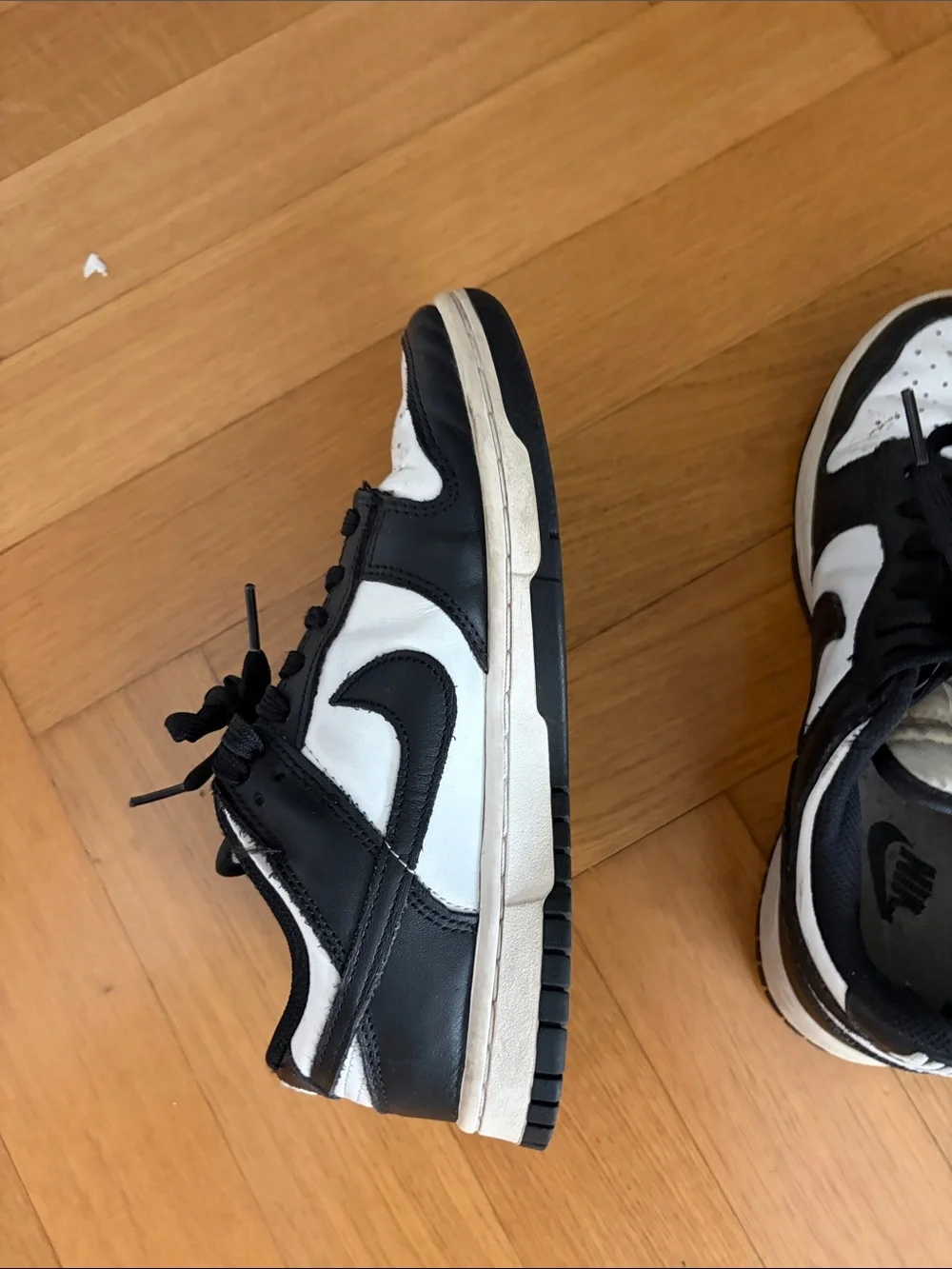 Nike women’s Black and White Low-Top Sneakers